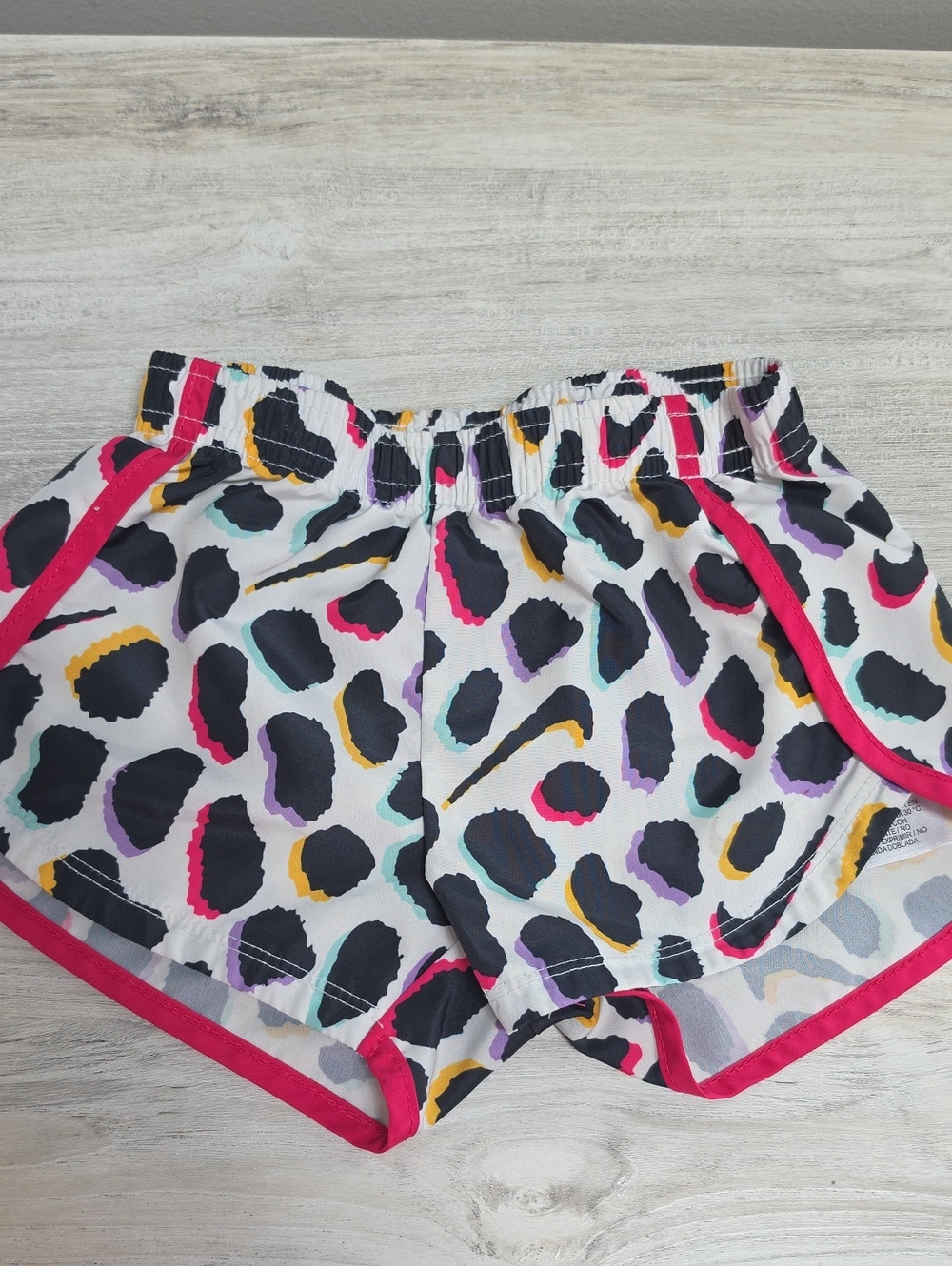 Nike Kids White Shorts with Black, Pink, Yellow & Purple Spot Print